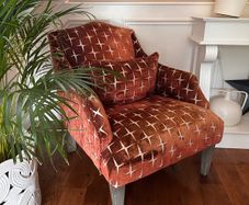 Armchair in Harlequin Issora Orange Material