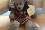 collectible tradtional style glass eyed Teddy bear dressed in usa stars and stripes
