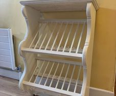 Wall mounted plate holder