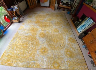 Large yellow and cream rug