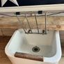 Heavy vintage ceramic basin with a built-in metal rack. Image 4