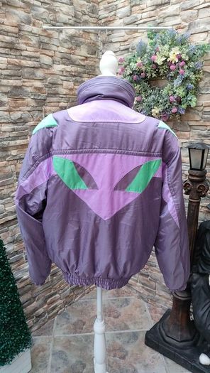 Vintage Descente 1980s ski jacket Official supplier of the Suisse ski team This is a rare and unique piece The quality and finish on the jacket is extremely high  It's in mint condition for its age Size medium