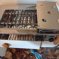 Mid Century Modern Chrome Bar Heater & grill.  Fully Working Vintage 1970s Electric Fire & grill . Still in the packaging. Pristine condition. Working without issue.