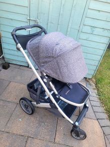 Uppababy Cruz V2 with newborn insert and adapters