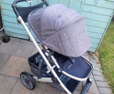 Uppababy Cruz V2 with newborn insert and adapters