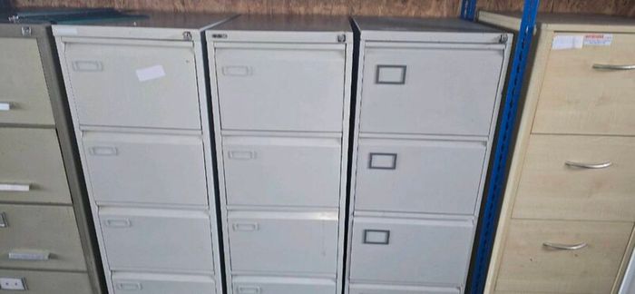 40 second-hand 4 drawer filing cabinets.