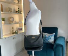 Carvela Black Handbag with gold chain.