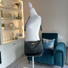 Carvela Black Handbag with gold chain.