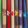 Ten Multicoloured woven bamboo placemats. Image 7