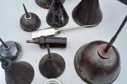 12 vintage oil cans