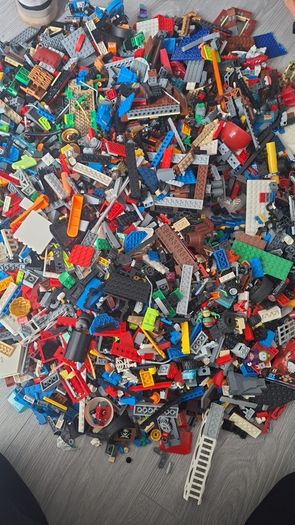 Large box of lego , accessories and weapons