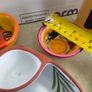 Cheese knife set with magnetic base 15.00 euro, Pottery/Terra Cotta Bowl w/side Section, Olive Pattern, Portugal and 2 small bowl  18.00 euro.,.Ceramic Garlic Lemon Grater Plate Hand Painted 12.00 euro.,Glass display small dome with white carmic tea light Image 9