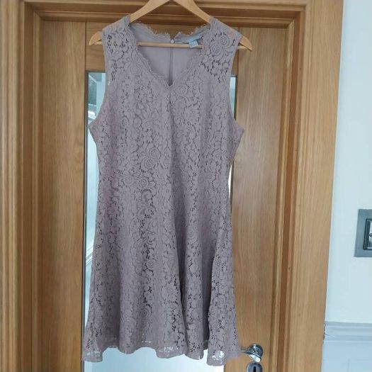 Ladies A line swing style dress and cardigan.