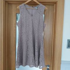 Ladies A line swing style dress and cardigan.