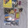 Medium cardboard box filled with toys and other bits Image 3