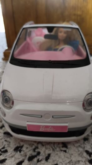 Barbie with car.