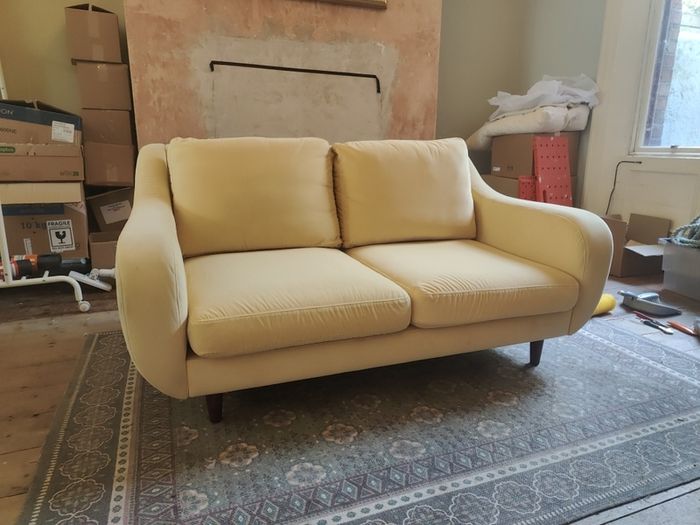Mid century yellow velvet couch
