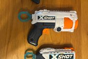 3 Xshot guns and targets and bullets