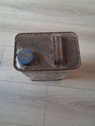 antique oil can