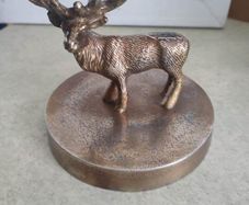 Vintage Brass effect Deer on circle base.
