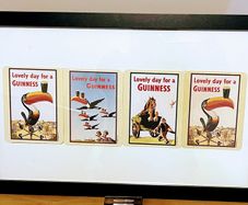 Framed collection of Guinness collectible bar mats