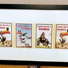 Framed collection of Guinness collectible bar mats