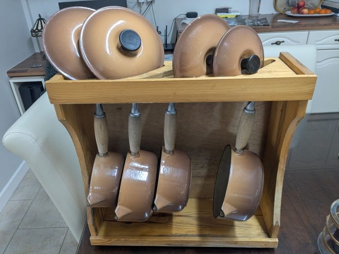 Le Creuset pots cast iron with lids and storage