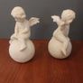 Lovely Vintage Pair of Ceramic Baby Winged Angels Sitting on Globes with a Very Tactile Cream Coloured Crackle Glaze Image 9