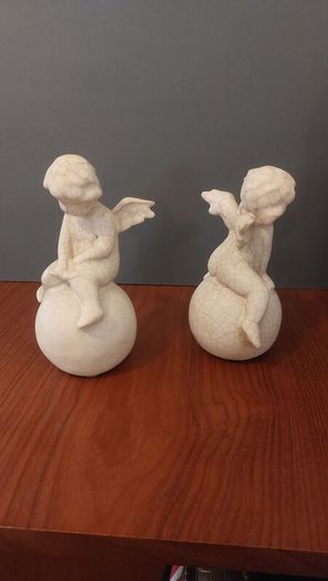 Lovely Vintage Pair of Ceramic Baby Winged Angels Sitting on Globes with a Very Tactile Cream Coloured Crackle Glaze