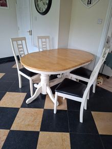 Extendable solid timber table and 6 chairs
