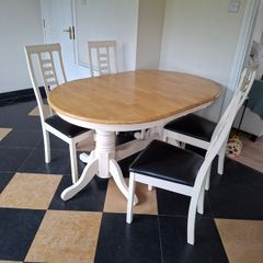 Extendable solid timber table and 6 chairs