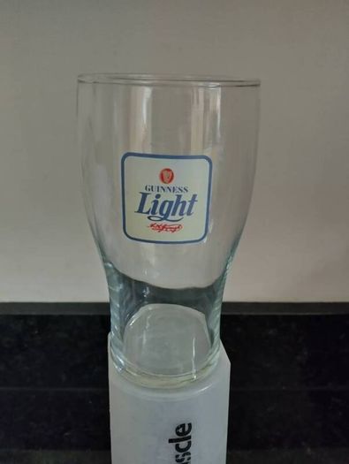 Guinness Light pint glass and beer mats