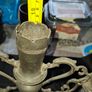 Antique Late 19th early 20th century three light candelabra, with scalloped candle nozzles, scrolling foliate branches and an oval base with chased decoration Image 5
