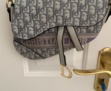 Beautiful inspired grey cross overt bag