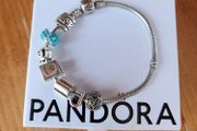 Pandora bracelet with authentic Pandora charms included and giftbox