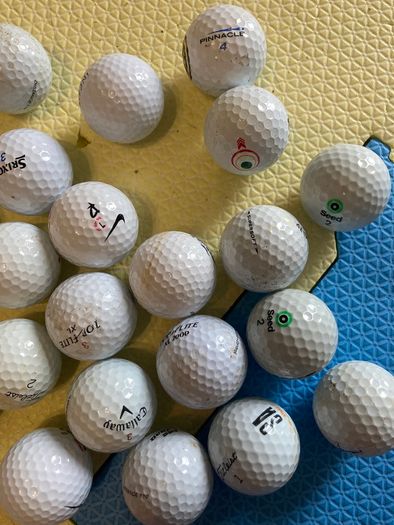 23 Mixed brand golf balls