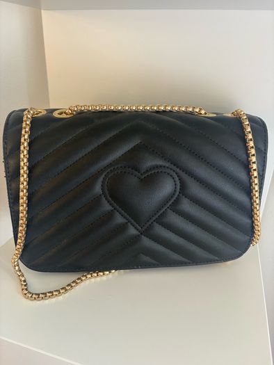 ladies black padded bag with gold coloured hardware. Brand new