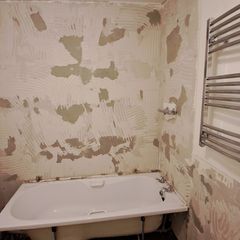 All together - bathtub, sink with a tap, bathtub glass, wall tiles