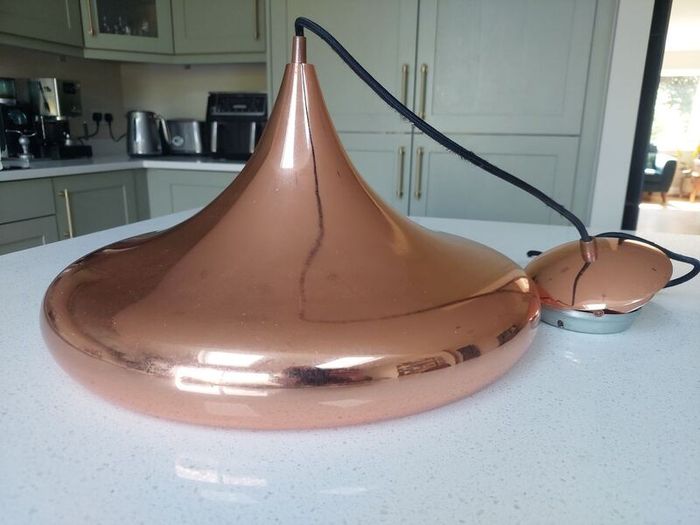 Copper pendant ceiling light. Lovely shape.