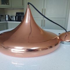 Copper pendant ceiling light. Lovely shape.
