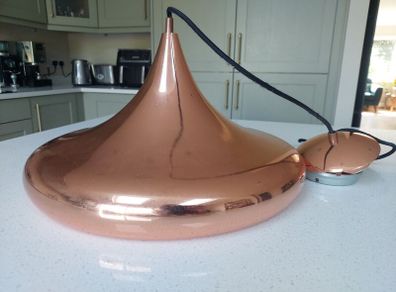 Copper pendant ceiling light. Lovely shape.