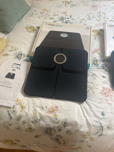 weighing scales FitBit and FitTrack