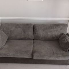 sofa with pouffe