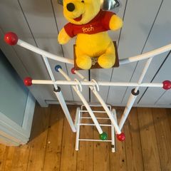 Antique baby clothes rack Winnie the Pooh
