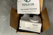 Dual cylinder thermostat