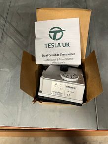 Dual cylinder thermostat