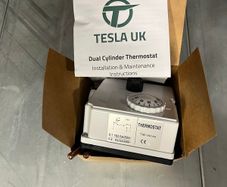Dual cylinder thermostat