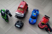 3 remote control vehicles &amp; 1 blue racecar with lights &amp; sounds