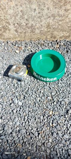 heineken plastic ashtray, hard to come by,,few little marks underneath, overall nice condition, see pictures for condition, sold as seen ,price includes post, or if buyers collect, cheaper.