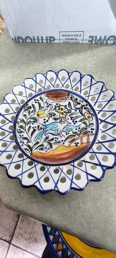 3 hanging wall plates -1- from Malta hand painted -2- from PORTGAL HAND PAINTED-3- FROM MAROCO - EACH IS 22.00 Euro.